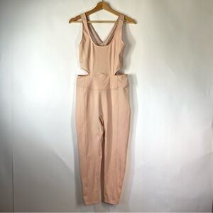 Free People Movement Back It Up Onesie Jumpsuit Size L Peach Crossback One Piece